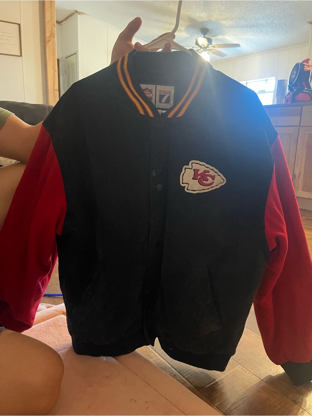 NFL Black Jacket with Red Sleeves and Yellow Trim